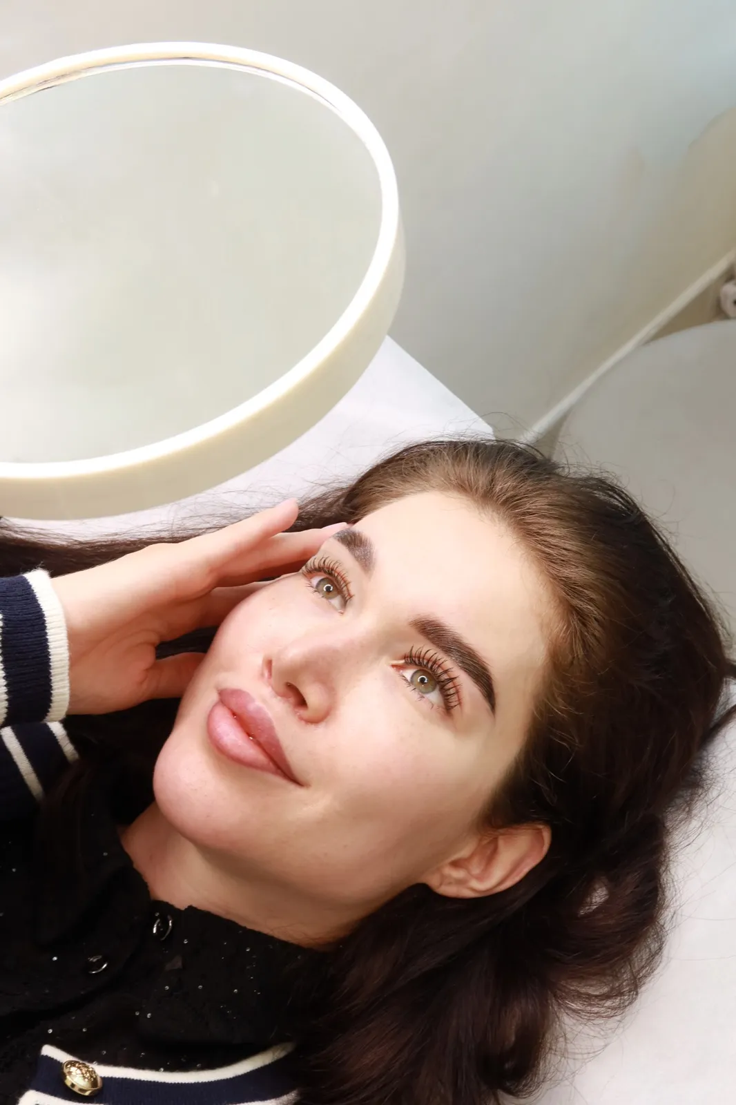 Cleansing facial at Azizam beauty salon in Dubai — lifted brow and lash result