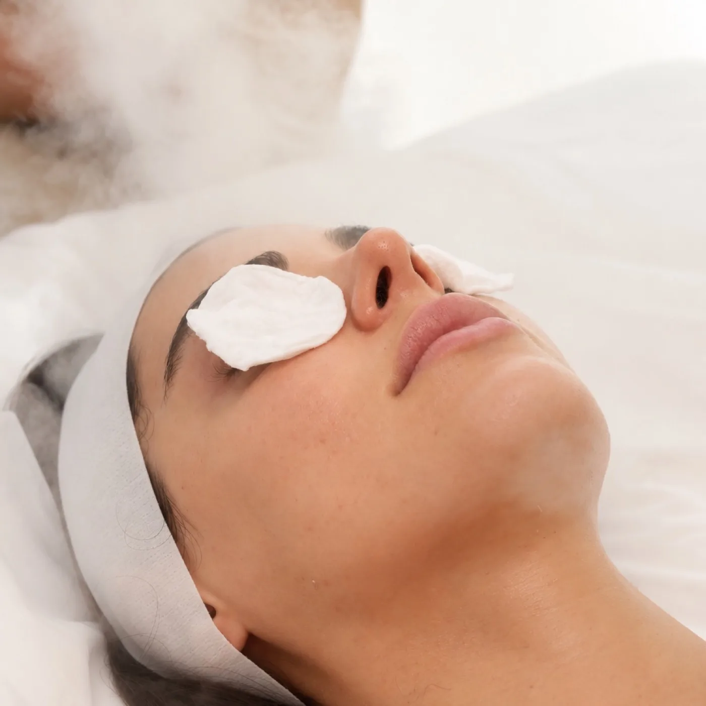 Cleansing facial in Dubai, steam softening the skin at AZIZAM beauty salon