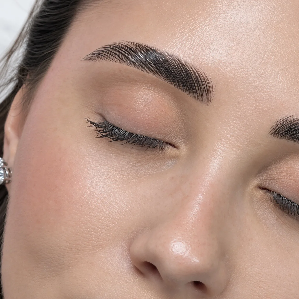 Brow lamination result in Dubai, brushed-up, softly groomed brows at AZIZAM beauty salon